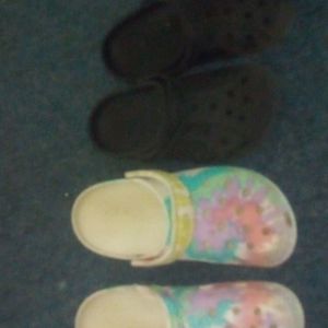 Two pair of Crocs